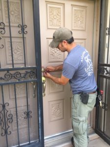 Levi repairing a front door lock